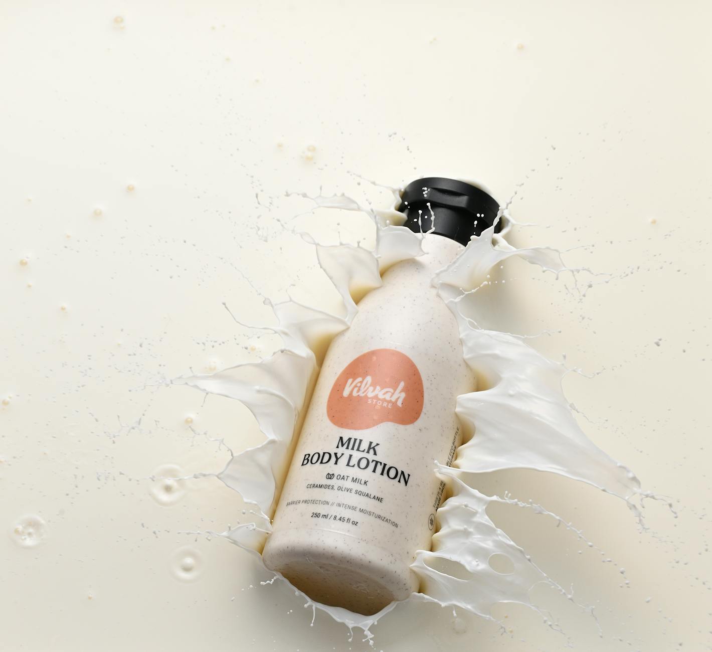 Creative shot of milk body lotion with a splash effect for a fresh and hydrated feel.