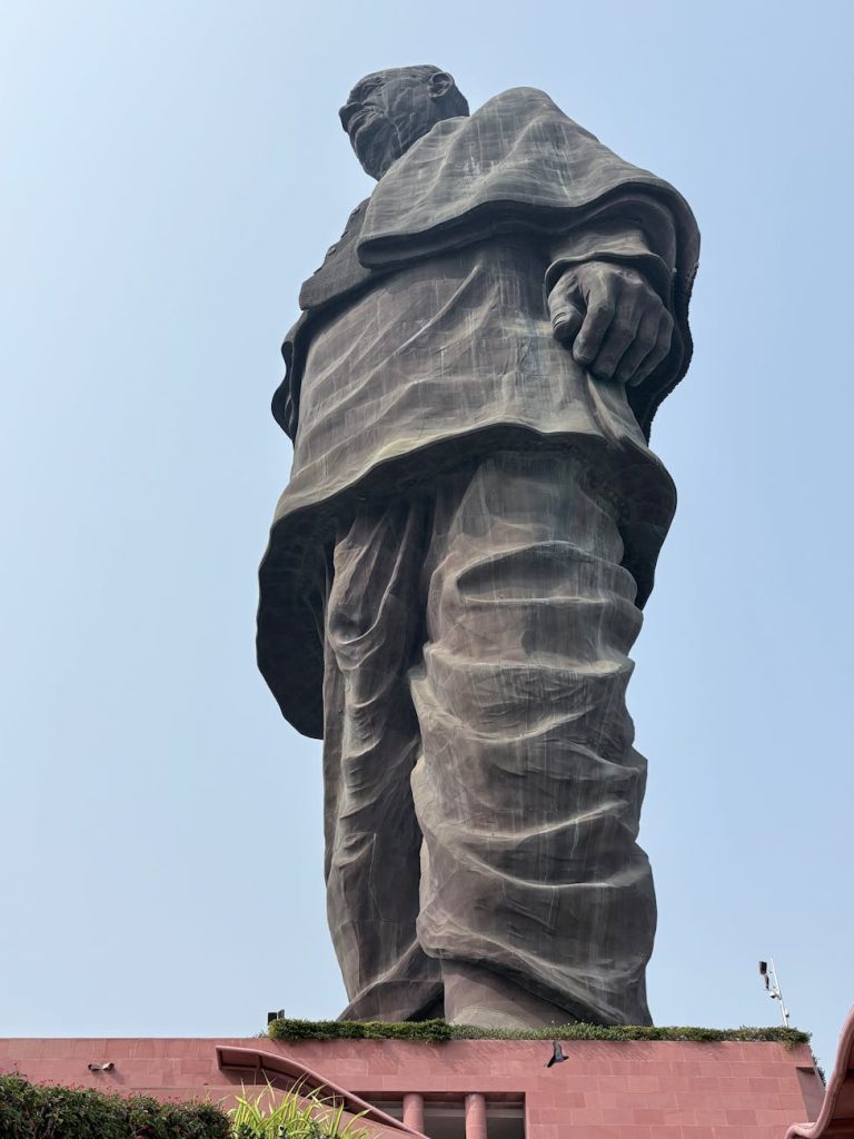 the statue of unity under a clear blue sky