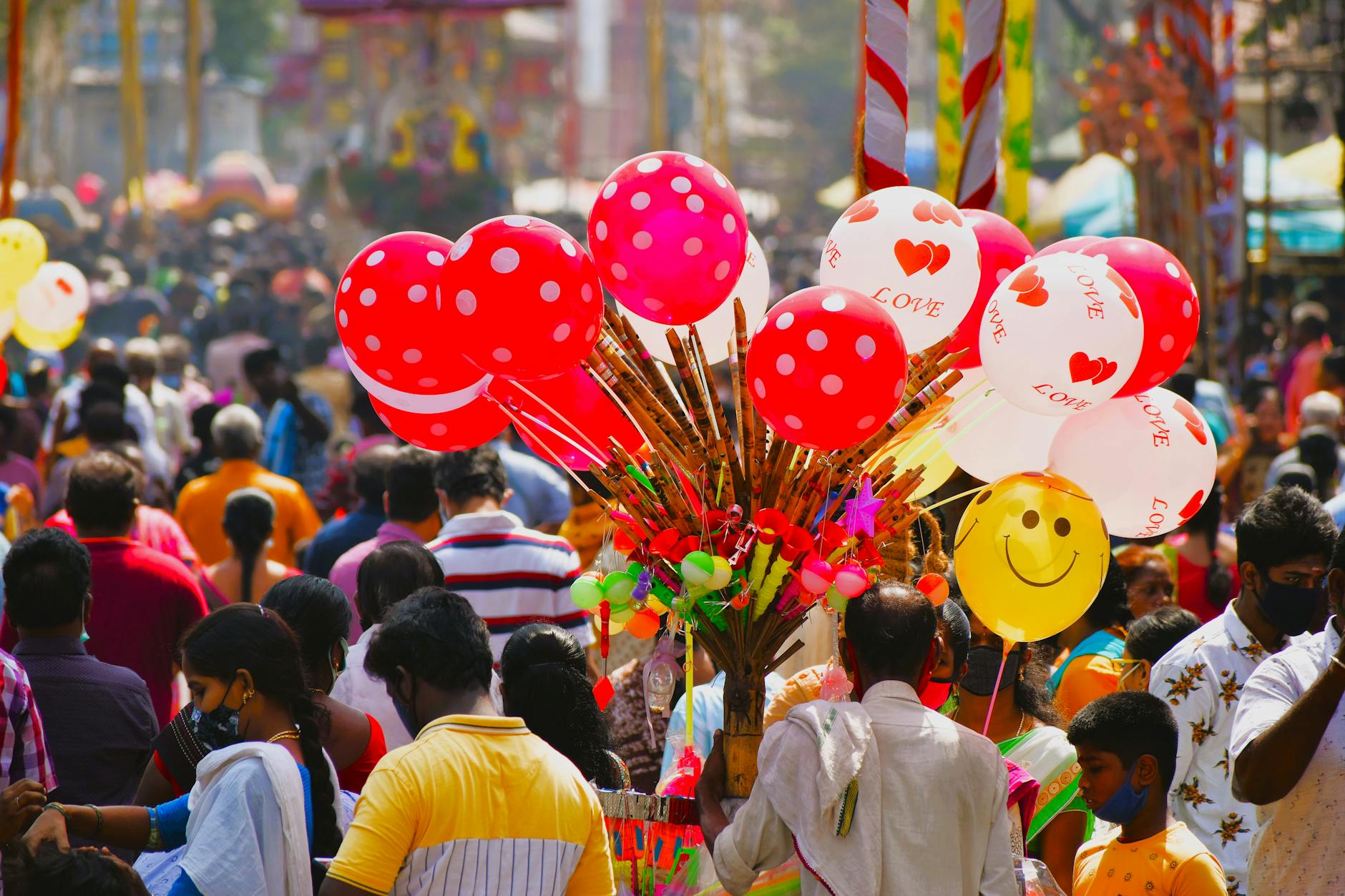 vibrant street festival with colorful balloons